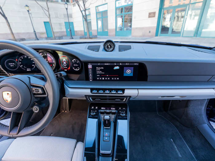 ... Porsche infotainment system, which runs off a central touchscreen.