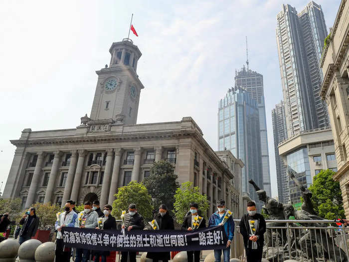 Life has been slowly getting back to normal in China as provinces start lifting their lockdowns. These people outside Hankou Customs House in Wuhan made sure to keep some distance between them during their moment of silence.