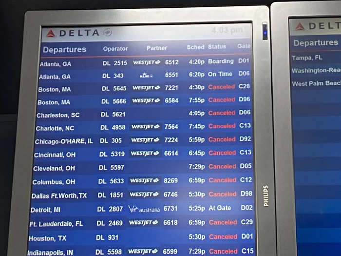 The flight-status monitors were a stark reminder of the pandemic