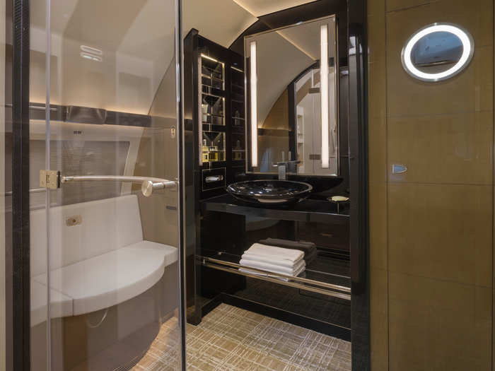 Directly behind the bedroom is the master bathroom complete with a walk-in shower, and full vanity. Airbus and Boeing private jets are known for their showers, which aren