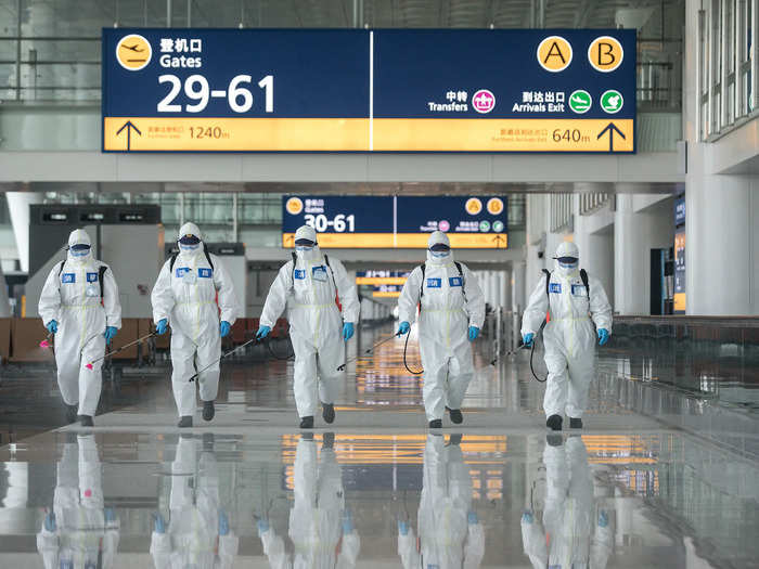 In anticipation of the travel ban being lifted, crews were sent to disinfect the airport...