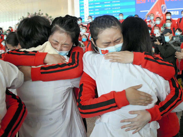 Healthcare workers from the Jilin province, who had traveled to Wuhan to aid in the response to the outbreak, were among the first to board flights out of the city.