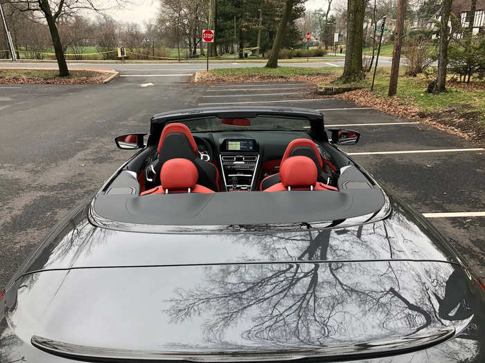 The entire operation is controlled using a single button on the center console. The M8 lets you know when the top is completely stowed.