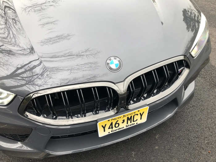 The blades of the grille are rimmed in chrome, and the legendary BMW badge occupies  its familiar position on the hood.