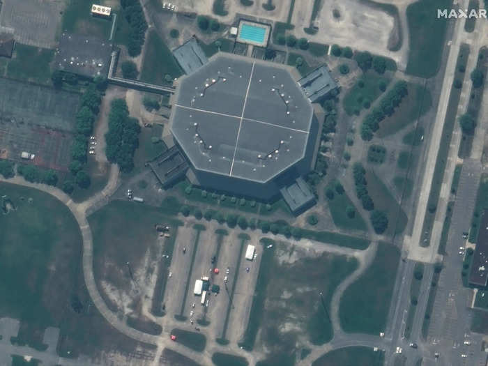 This satellite image shows the parking lot of the University of New Orleans Lakefront Arena, which the US Department of Health and Human Services and the City of New Orleans have transformed into a COVID-19 testing site.