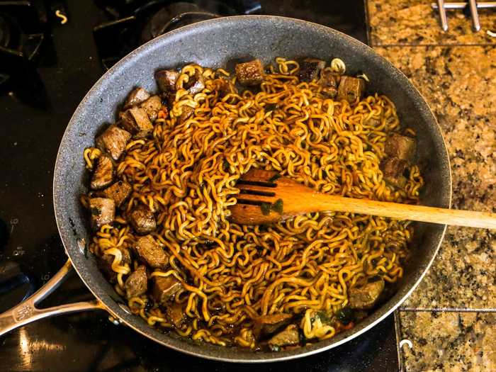 I stirred in the Chapagetti oil, dumped in my reserved noodle juice, and gave my nascent noodles a thorough stir.