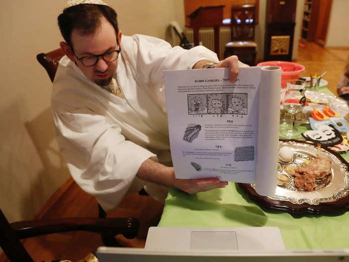 Some recited the Haggadah text, which guides the Seder meal, on screens this year, instead of face to face.