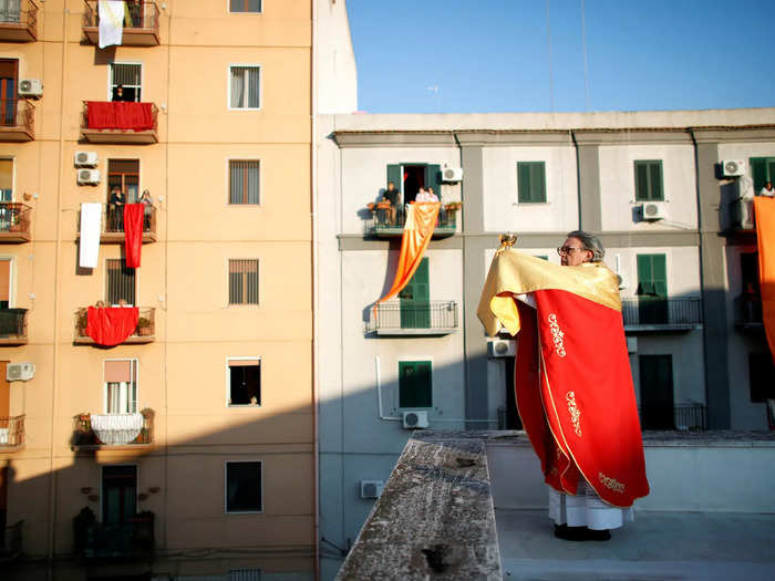 In the coastal southern town of Taranto, Italy, one priest took his Good Friday procession to the roof, so church neighbors could participate at a safe distance, from their balconies and windows.