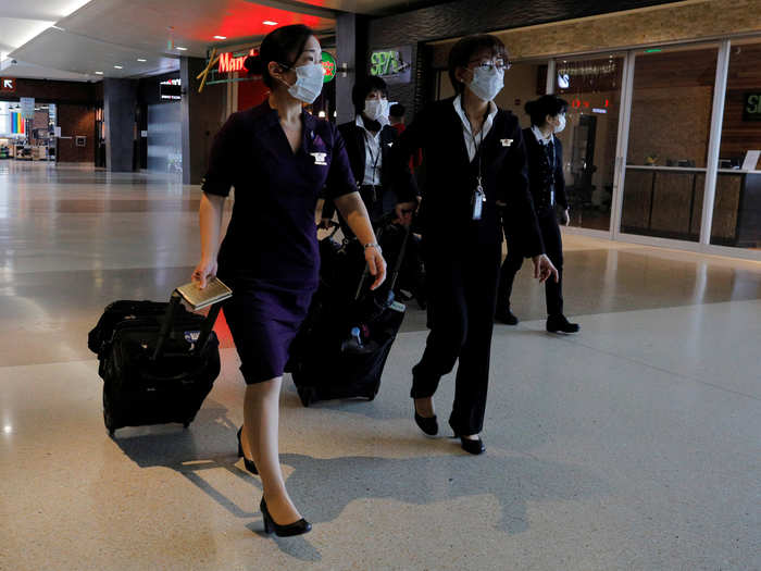 Passenger-facing crew, however, are donning personal protective equipment as they serve on the frontlines of the pandemic...