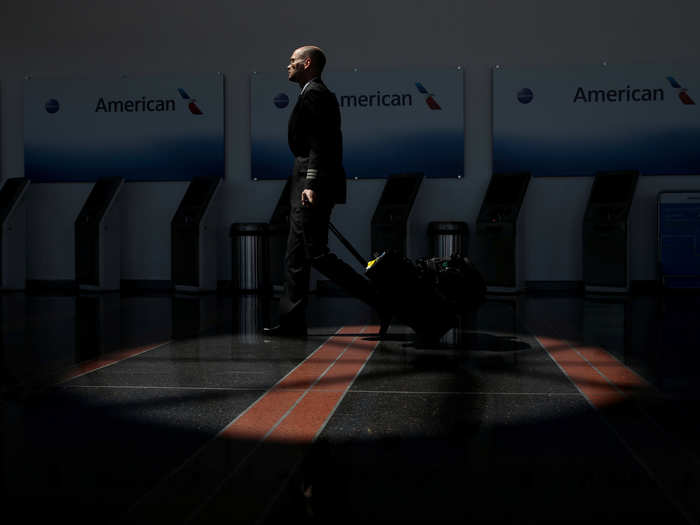 Flight crews remain the few remaining occupants of airport terminals as some flights continue to go, even with little to no passengers.