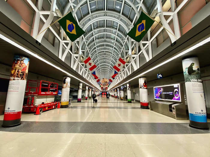 The iconic flag concourse at the airport is shown here empty at rush hour.