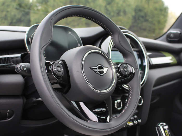 The multifunction steering wheel is sporty and leather-wrapped ...