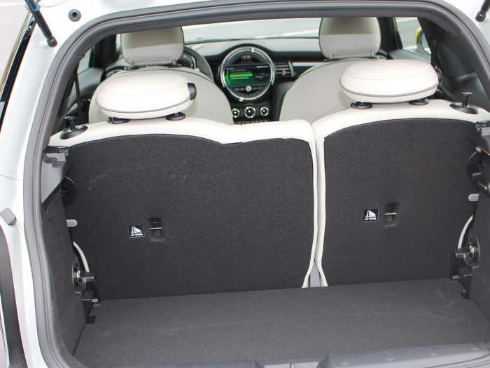 When the rear seats are up, the cargo area is a mere 7.5 cubic feet.