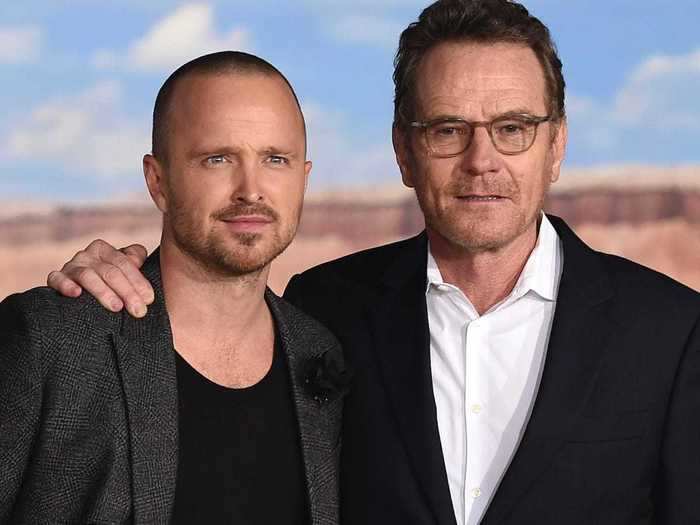 "Breaking Bad" stars Aaron Paul and Bryan Cranston followed Reynolds