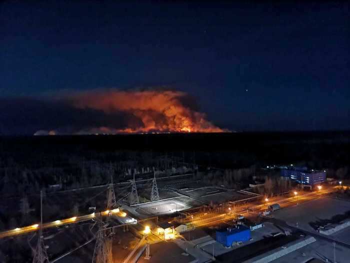 This April 10 photo, taken from the roof of the Chernobyl plant itself, shows just how close the fire had reached.