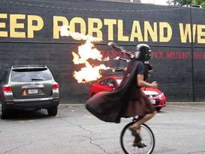 This unicyclist is definitely doing his part to "Keep Portland Weird."