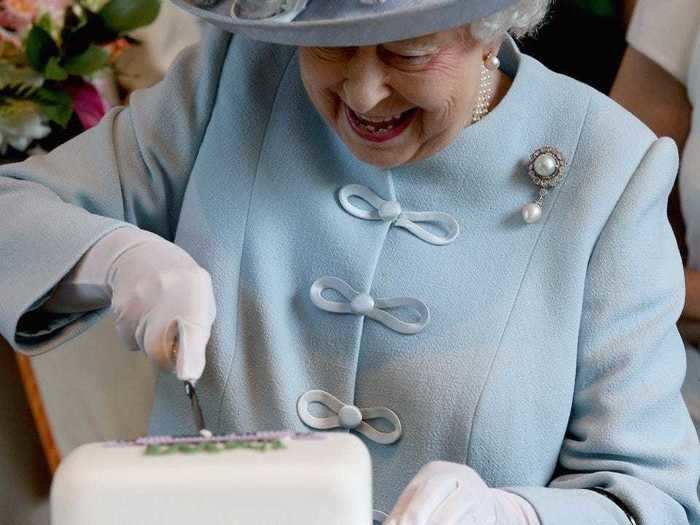 ... or cutting the honorary first slice of cake at events.