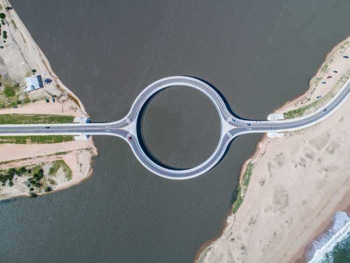 The unusual design of the Laguna Garzon Bridge in Uruguay forces drivers to slow down.