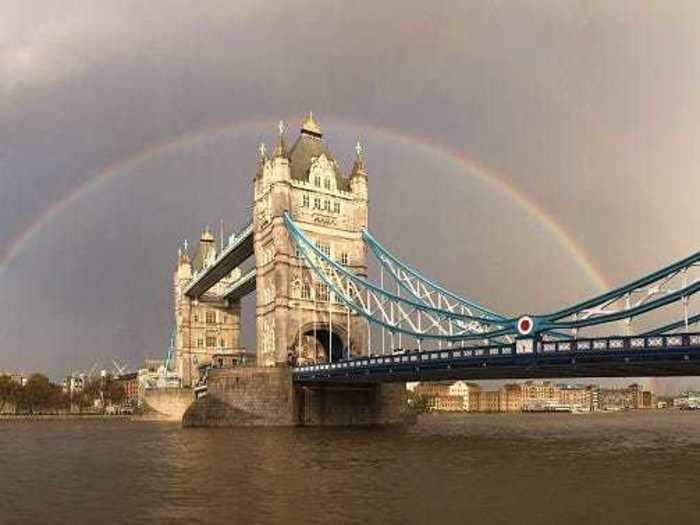 The world famous Tower Bridge in London looks like a castle floating in the Thames River.