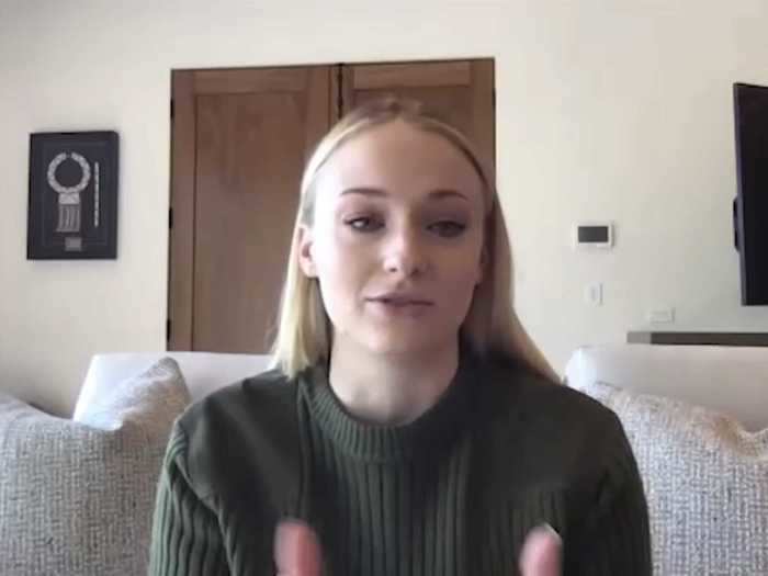 Sophie Turner dialed into "Conan" while wearing sweatpants on her couch.