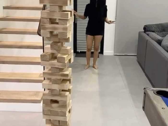 Cardi B created a giant game of "Jenga" in her home.