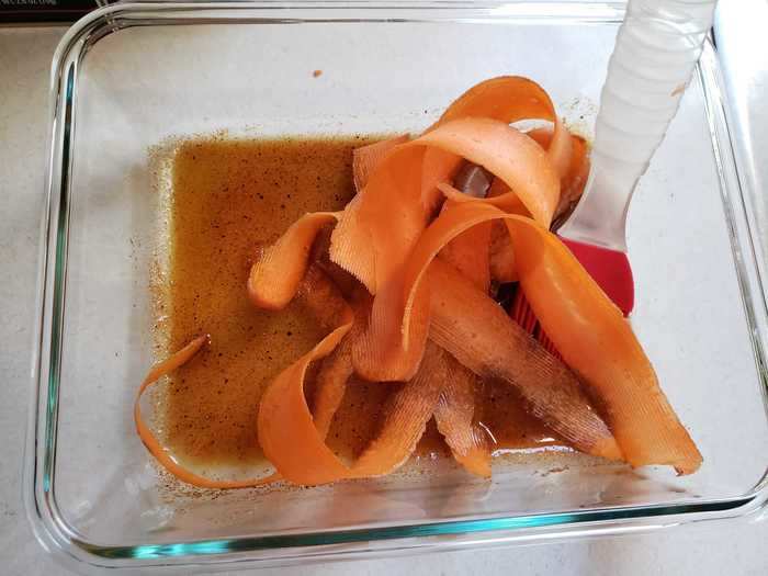 Then, I added my carrot slices to the marinade and mixed them around.