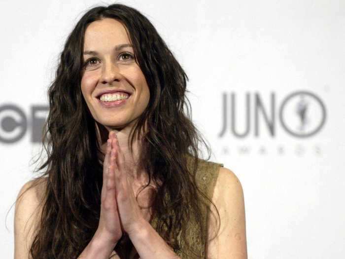 Alanis Morissette said she experienced postpartum depression more than once.