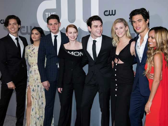 The actress praised Sprouse for helping the rest of the "Riverdale" cast navigate the pitfalls of fame in a February 2018 interview with Ocean Drive.