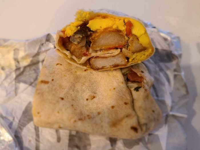 Grande toasted breakfast burrito with steak — $3.49