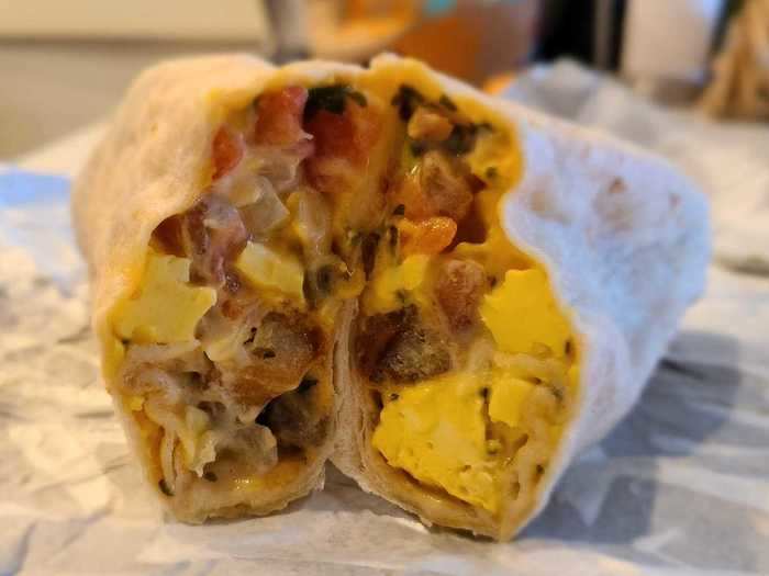 Grande toasted breakfast burrito with sausage — $2.79