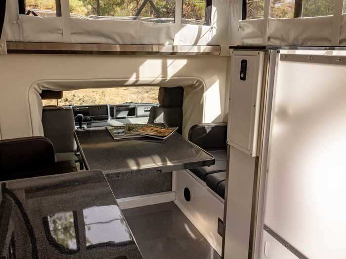 Four people can enjoy their off-grid, off-road meals at the dinette which, when lowered, also turns into a sleeping space for two adults.