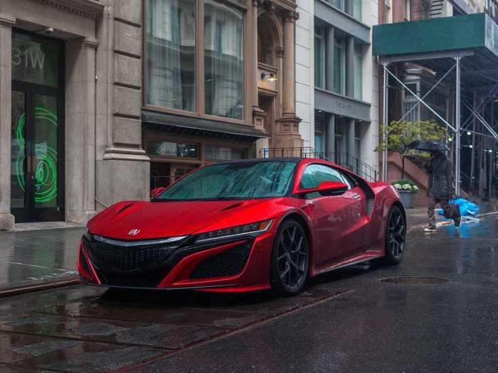 The Acura NSX was our 2016 Car of the Year. The engine is about as large as a suitcase and includes a pair of turbochargers. And yet, coupled with the NSX