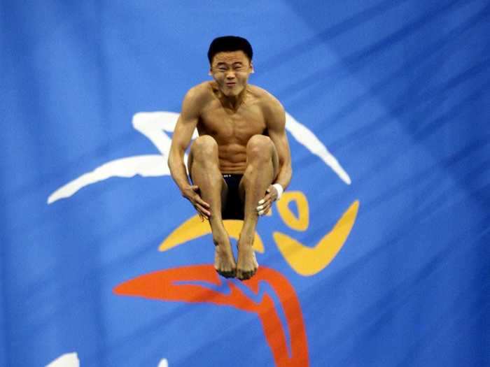 Chinese diver Hu Jia competed at the 2000 Summer Olympics in Sydney with a perfectly positioned dive.