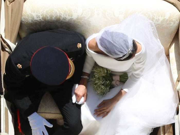 People thought this perfectly timed shot of Prince Harry and Meghan Markle on their wedding day was taken by a drone, but it was photographer Yui Mok.