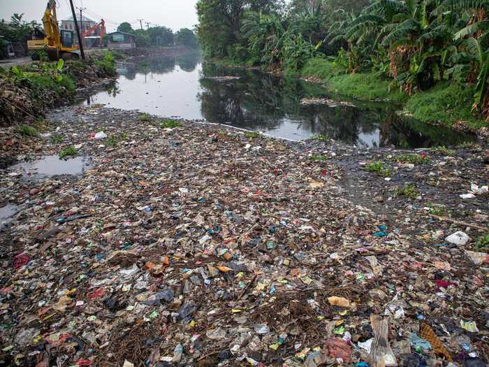 Human carelessness is also a factor in damage to forests, such as the garbage dump in Indonesia