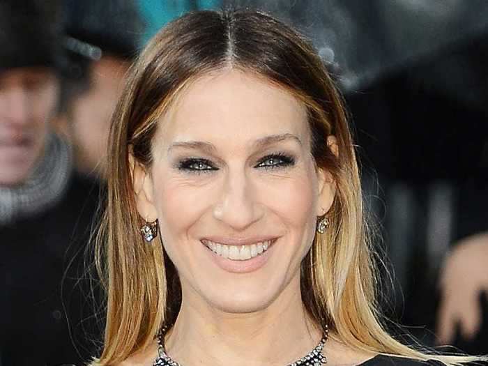 Sarah Jessica Parker wears her long locks straightened now.