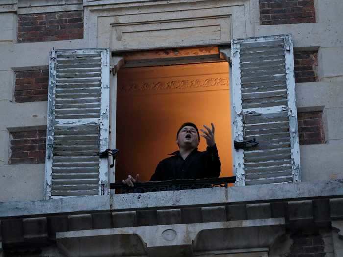 In France, a tenor singer, Stephane Senechal, performed to his neighbors and the streets below while under lockdown.