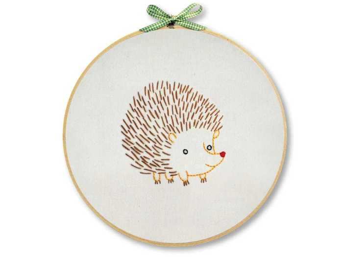 An adorable hedgehog to hang in a nursery room or child