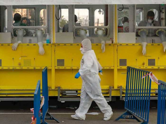 But new kinds of services are popping up. Israel recently introduced roadside testing booths that with a separating glass and rubber gloves attached to ensure zero contact between medics and testers.