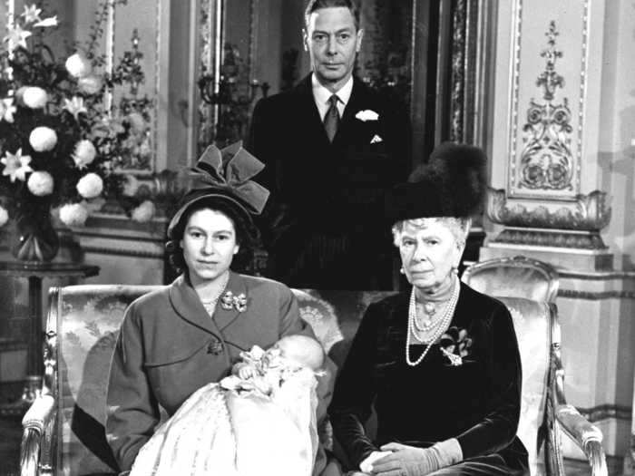 1948: Following the christening of Prince Charles in December 1948, this official photo was taken of the young royal, along with his mother, his grandfather King George VI, and his great-grandmother Queen Mary.