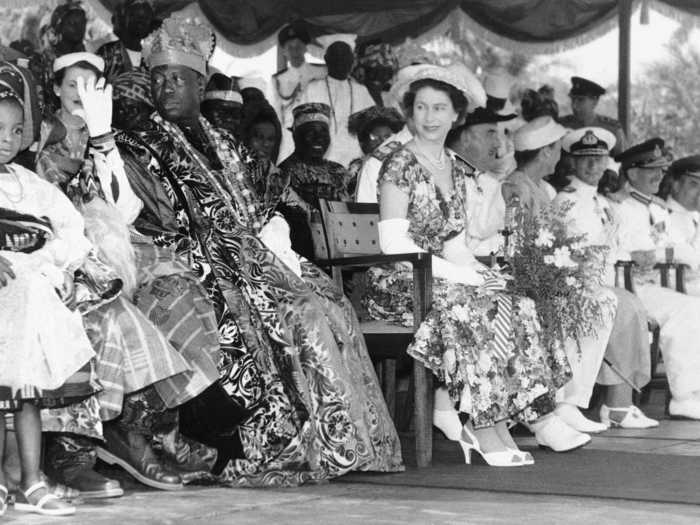 1956: Travelling and representing Britain overseas is a key part of her job. She and her husband, Prince Philip, visited the Lagos City boundary in Nigeria on their way to the city from Ikeja Airport in 1956. Here, she