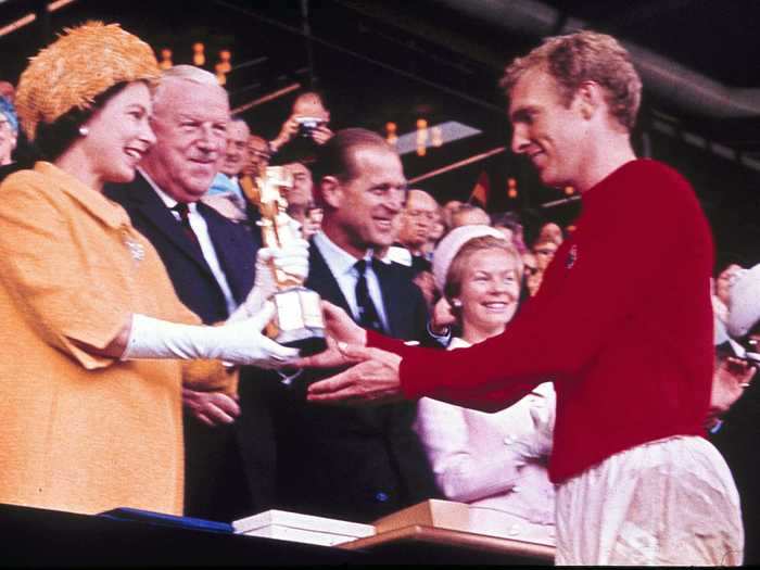 1966: Queen Elizabeth II presents the World Cup, the Jules Rimet trophy, to England