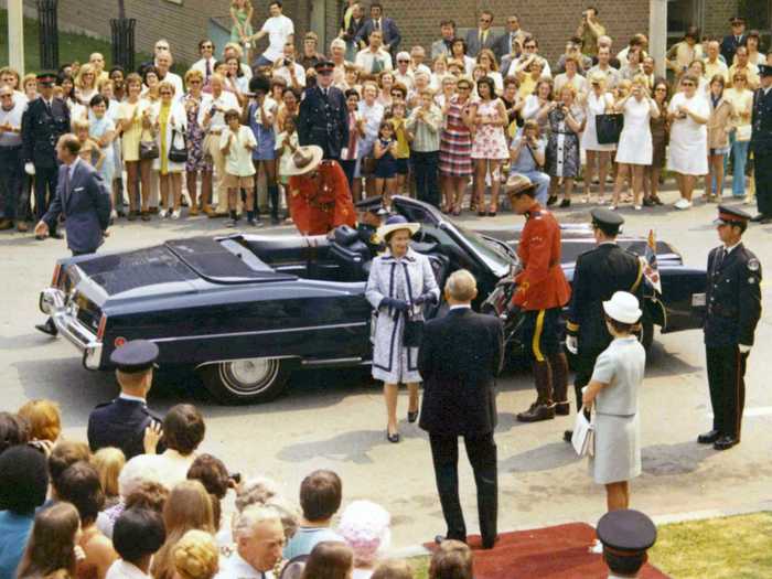 1973: Queen Elizabeth II, with her husband Prince Philip, left, arrive at an "Old Canada" exhibition, in High Park, Toronto.