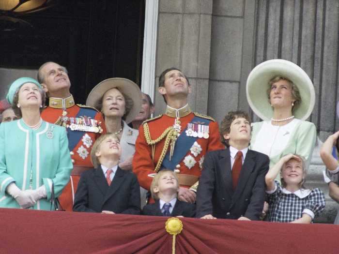 1990: The British Royal Family, including Queen Elizabeth II, Prince Philip, The Prince and Princess of Wales, Princess William and Harry, watched a flypast​, which marked the Queen