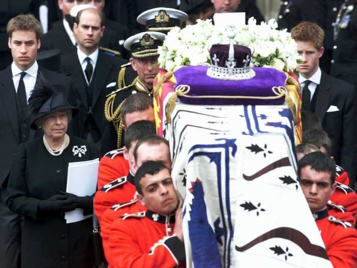 2002: This was a difficult year for the Queen. Her sister, Princess Margaret, and her mother died within a month of each other. The picture below shows the Queen and other members of the family during the funeral of the Queen Mother.