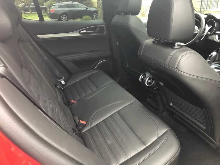 The rear bench seat is less pleasant than the fronts — and legroom isn