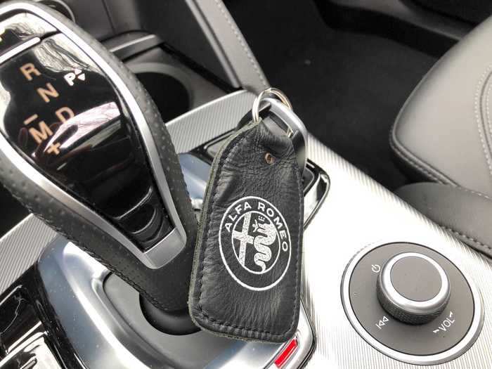 To the right on the shifter is a small key-fob holder.