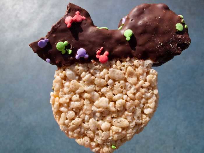 Disney theme parks sell Rice Krispies that are coated in chocolate, candy, and other delicious toppings.