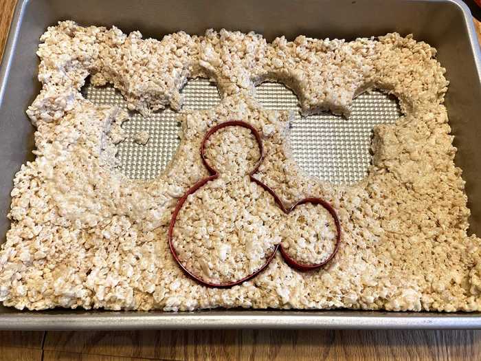 Then, it was time to cut the pressed mixture into Mickey Mouse shapes.