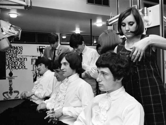 Men also kept up with trends, modeling hairstyles after popular British bands including The Kinks and The Beatles.